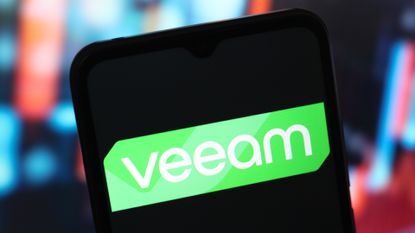 Veeam logo and branding pictured on a smartphone screen.
