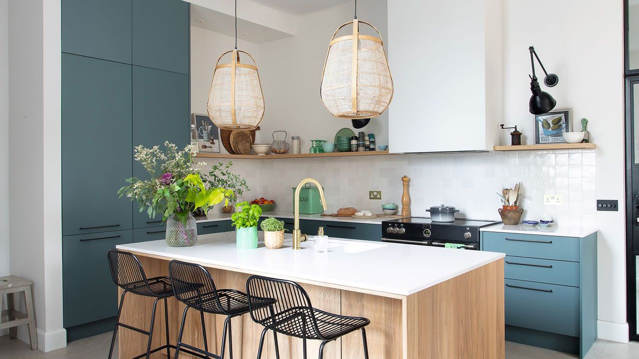 Kitchen with oak island and rattan pendant lights