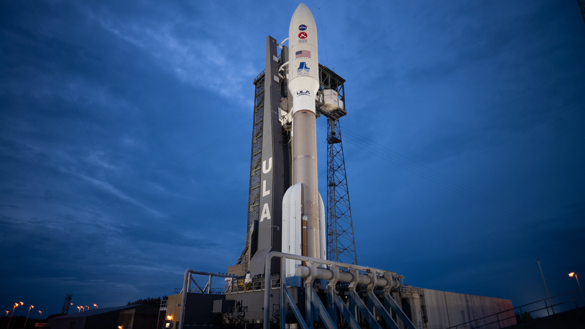 A United Launch Alliance Atlas V rocket with NASA’s Mars 2020 Perseverance rover onboard is seen illuminated by spotlights on the launch pad at Space Launch Complex 41, Tuesday, July 28, 2020, at Cape Canaveral Air Force Station in Florida.