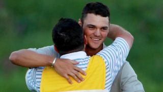 Martin Kaymer celebrates with his caddie after winning the 2010 PGA Championship at Whistling Straits
