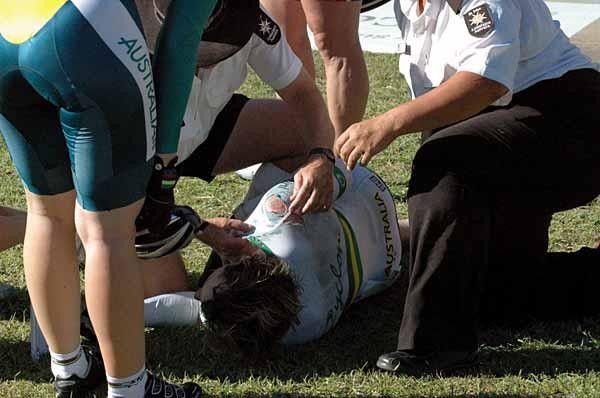 Ryan Bayley lies injured on the ground