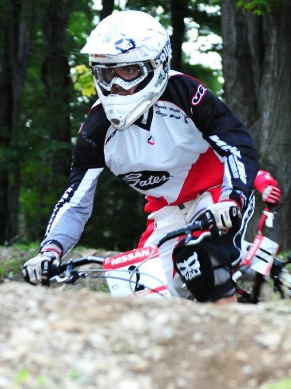 Quentin Derbier about to ramp off a jump.