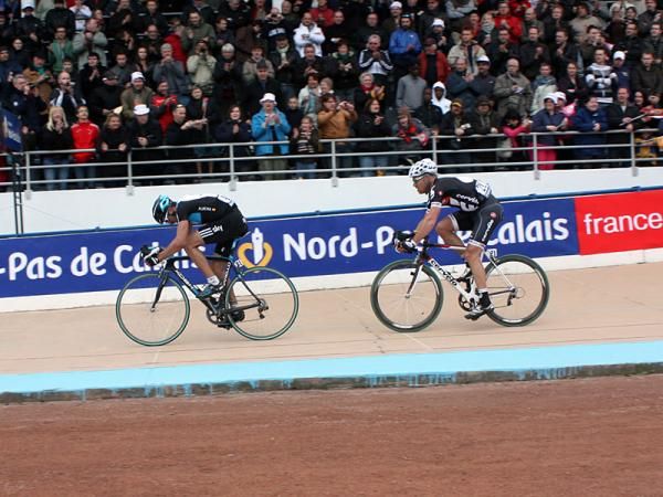 Juan Antonio Flecha (Team Sky) and Thor Hushovd (Cervelo TestTeam) arrive together at the Roubaix velodrome.