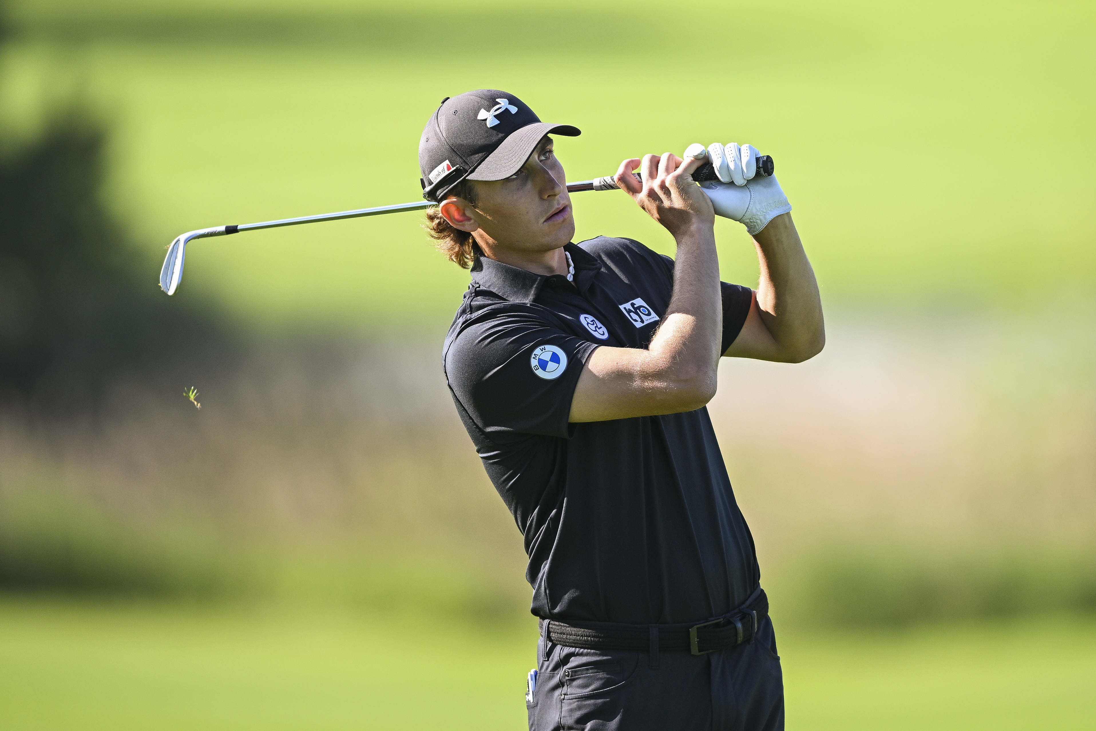 Cedric Gugler hits a wedge shot