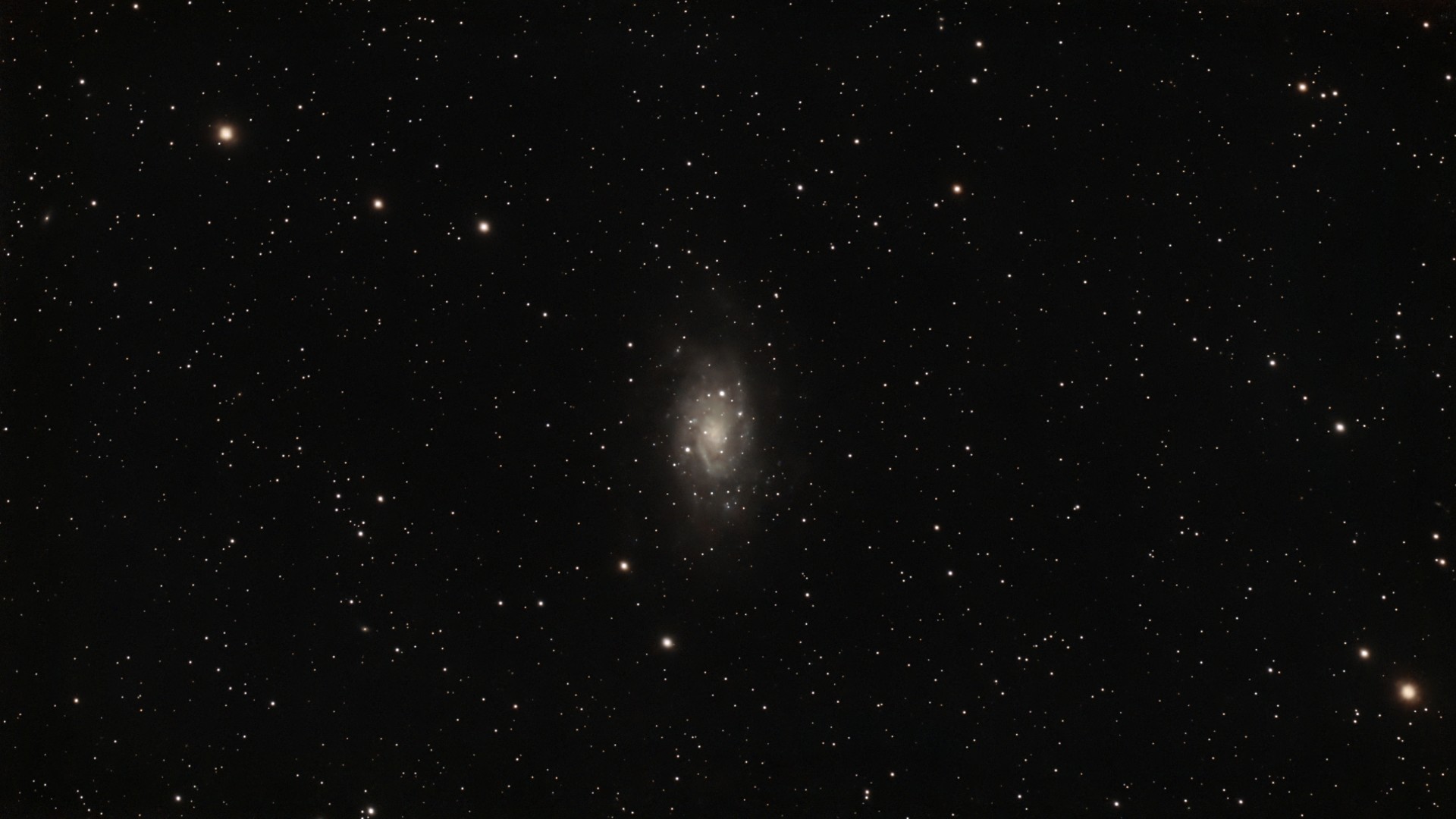 swirls of gas on a starry background