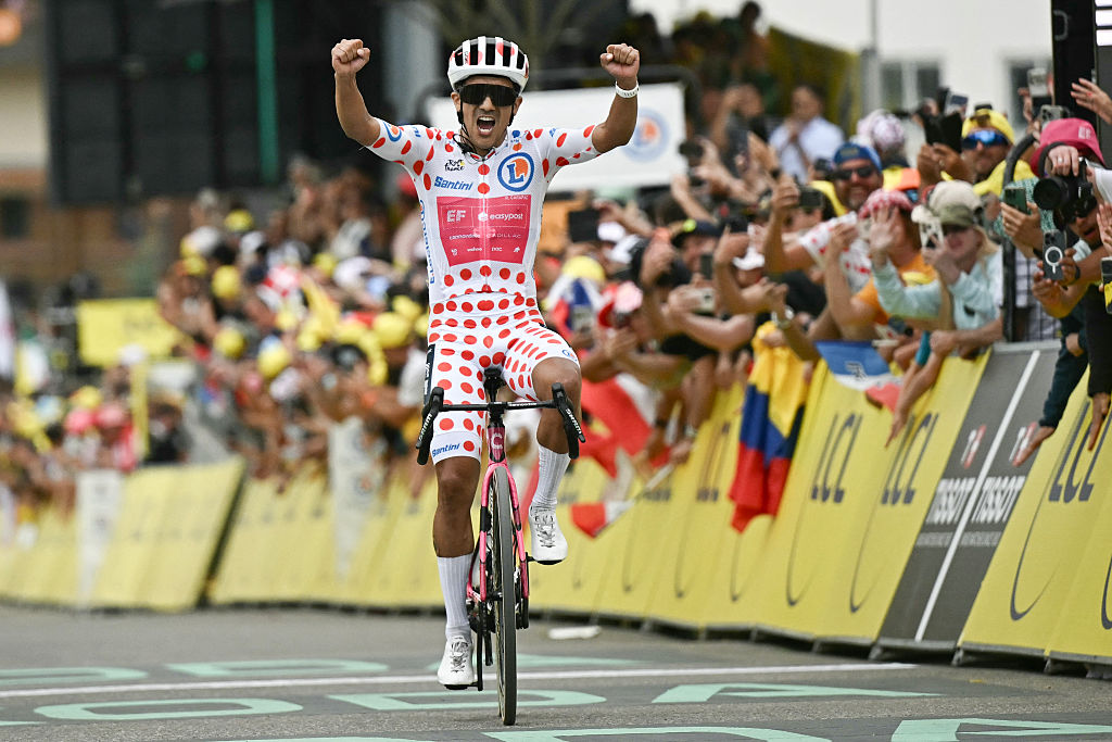 CYCLING-TDF-2026-STAGE 20EF Education - EasyPost team's Ecuadorian rider Richard Carapaz wearing the climber's dotted "King of the Mountains" jersey cycles to the finish line to win the 20th stage of the 113th edition of the Tour de France cycling race, 170,9 km between Le Bourg-d'Oisans and Alpe d'Huez in the French Alps, on July 25, 2026. (Photo by Loic VENANCE / AFP via Getty Images)