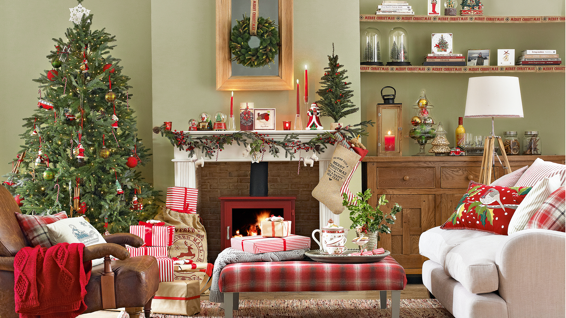 Green living room decorated with Christmas with one of the best artificial Christmas trees