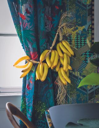 A living room with tropical prints