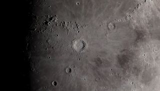 Sunlight dances across the moon in this still image from a spectacular NASA video of the lunar surface created with data from the Lunar Reconnaissance Orbiter and set to the song "Clair de Lune."