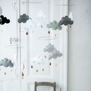 room with cloud and rainy print board