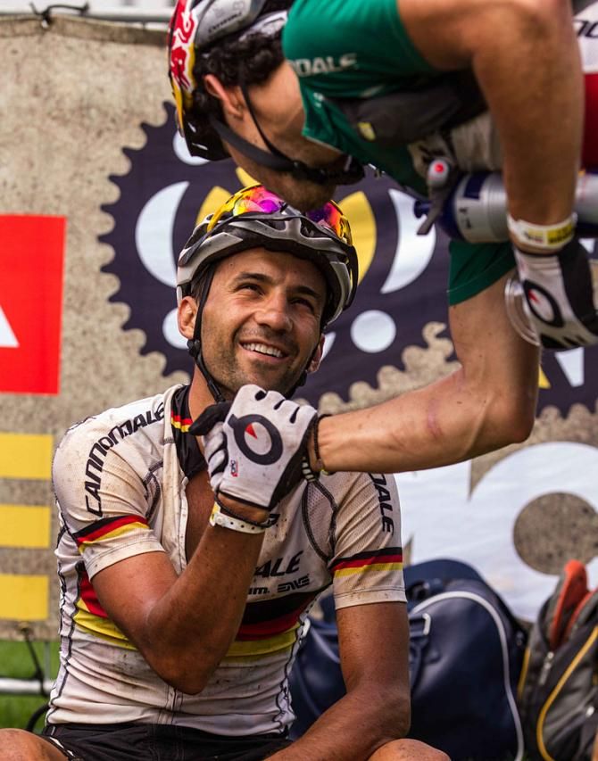 Marco Aurelio Fontana and Manuel Fumic of Cannondale Factory Racing congratulate each other