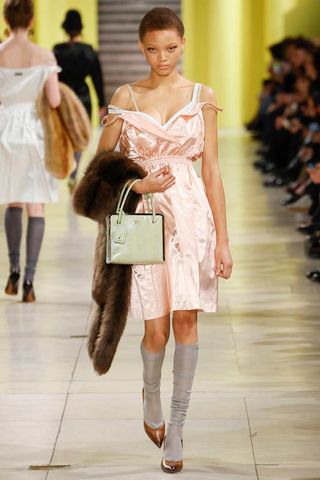 a model walks the Miu Miu fall/winter 2025 runway