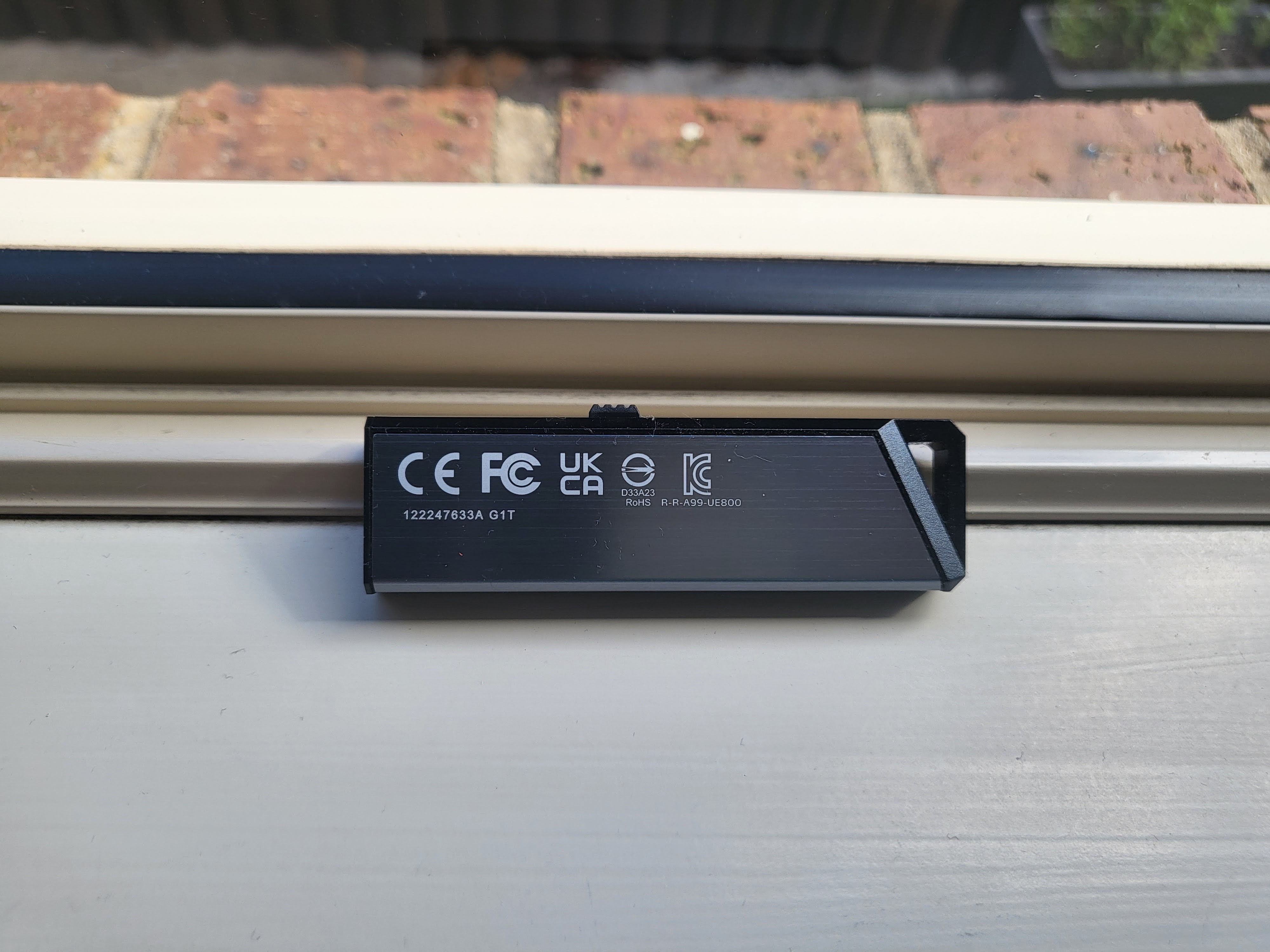 Adata UE800 1TB SSD on a window sill during our test and review process