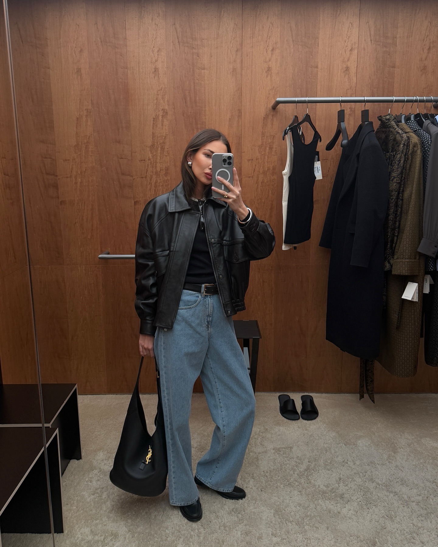 Influencer wearing a leather bomber jacket