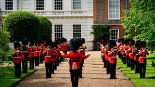 The Band of the Coldstream Guards in the gardens of Clarence House