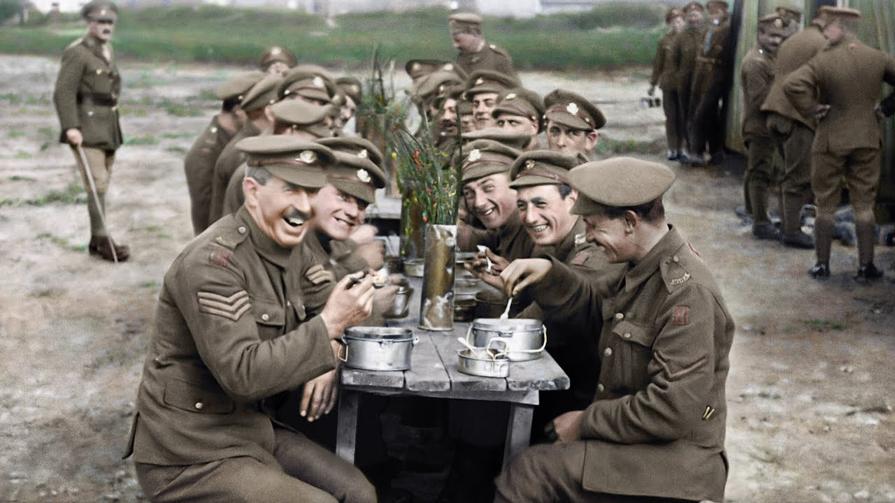 British soldiers sitting for a meal in They Shall Not Grow Old