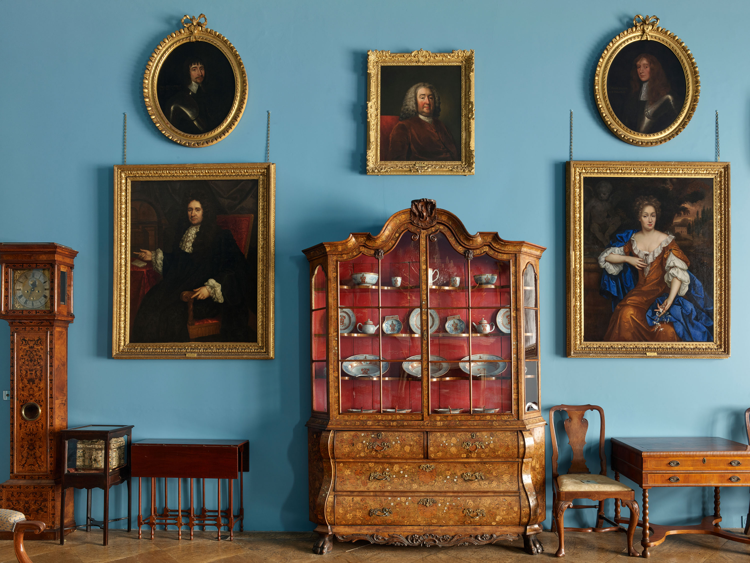 Blue drawing room with Dutch cabinet and Hulse portraits