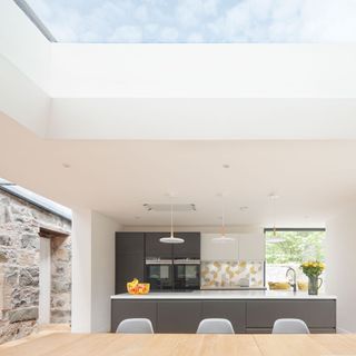 kitchen with dining area and white ceiling