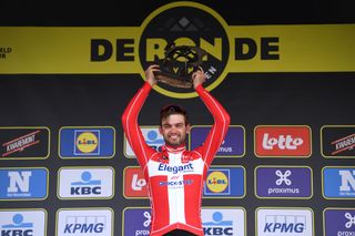 OUDENAARDE BELGIUM APRIL 04 Podium Kasper Asgreen of Denmark and Team Deceuninck QuickStep Celebration during the 105th Ronde van Vlaanderen Tour of Flanders 2021 Mens Elite a 2515km race from Antwerp to Oudenaarde Trophy RVV21 rondevanvlaanderen tourofflanders on April 04 2021 in Oudenaarde Belgium Photo by Tim de WaeleGetty Images