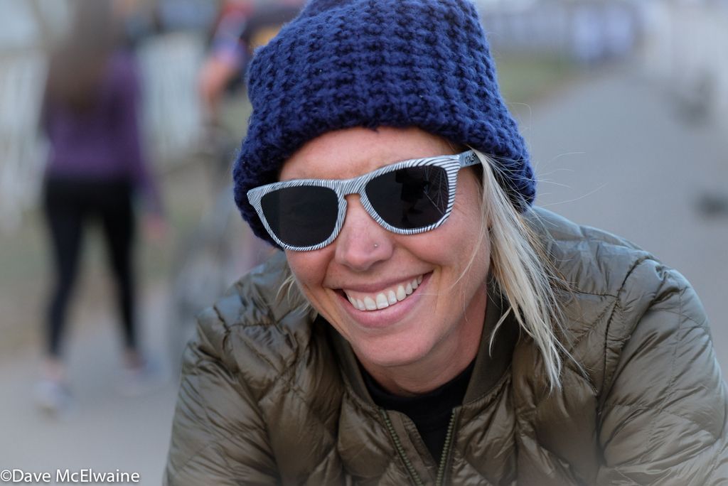 Smiling Emily Kachorek (Squid Bikes) chilling after her race