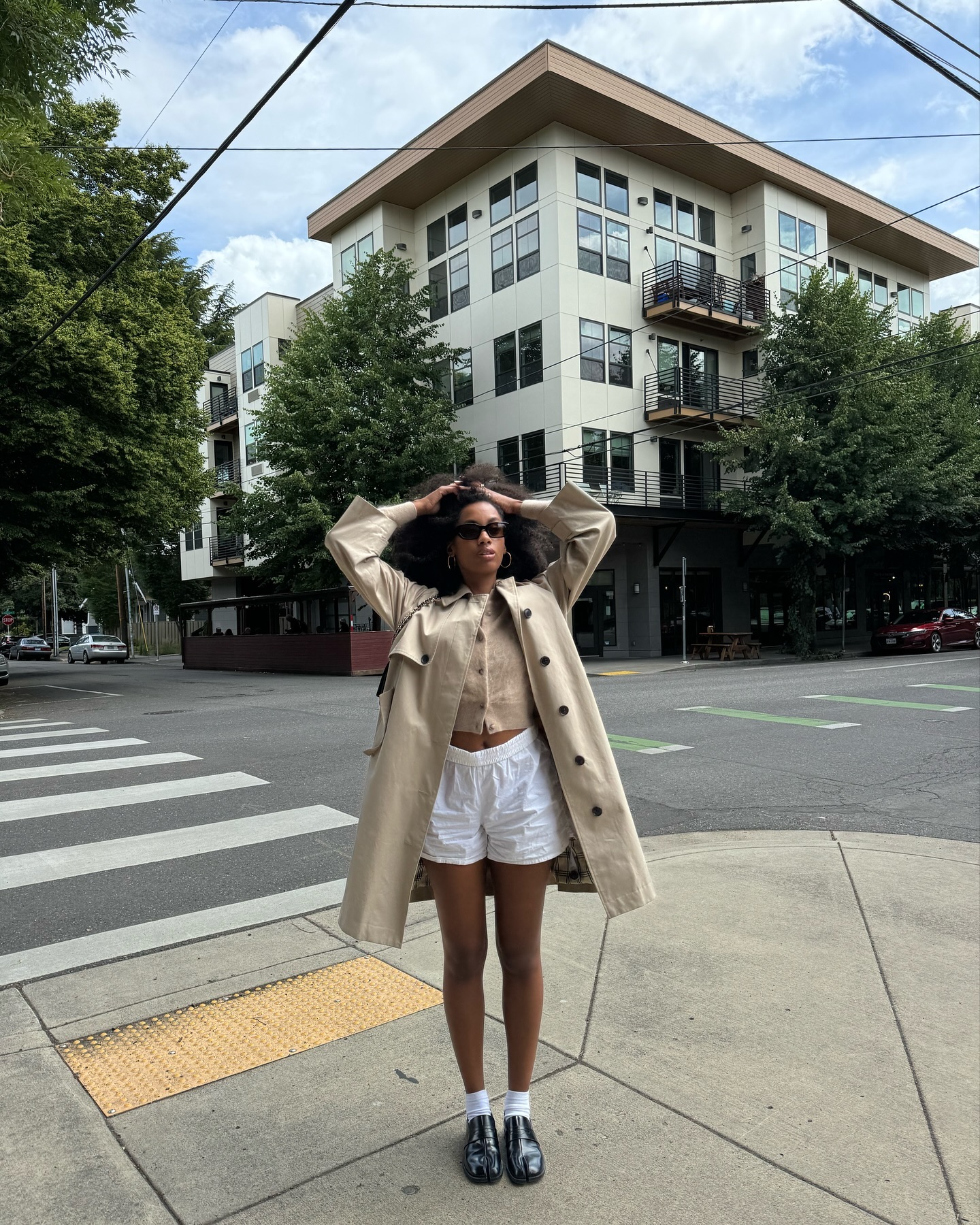 An image of @claire_most wearing cotton poplin shorts, one of the biggest short trends of 2025.
