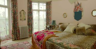 Alice temperley's house bedroom with leopard print bed and pink walls