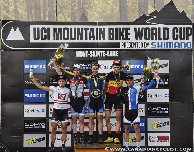 The elite men's podium at the eliminator World Cup in Mont-Sainte-Anne, Quebec, Canada