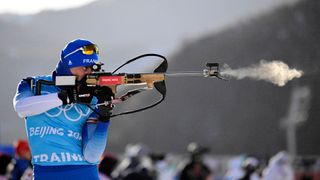 France's Simon Desthieux trains at the shooting range during a biathlon practice session at the National Biathlon Centre in Zhangjiakou on February 2, 2022, ahead of the Beijing 2022 Winter Olympic Games