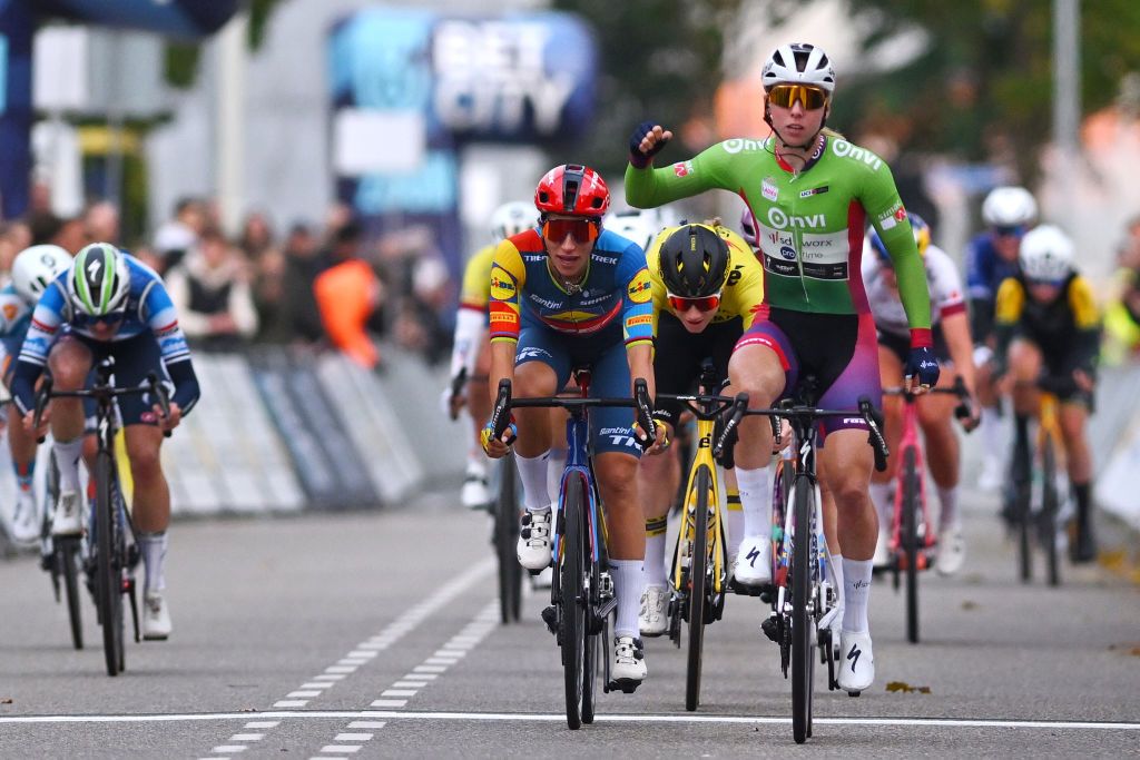 DOETINCHEM NETHERLANDS OCTOBER 12 Lorena Wiebes of The Netherlands and Team SD Worx Protime Green Points Jersey celebrates at finish line as stage winner ahead of LR Elisa Balsamo of Italy and Team Lidl Trek and Nienke Veenhoven of The Netherlands and Team Visma Lease a Bike during the 26th Simac Ladies Tour 2024 Stage 5 a 140km stage from Doetinchem to Doetinchem UCIWWT on October 12 2024 in Doetinchem Netherlands Photo by Luc ClaessenGetty Images