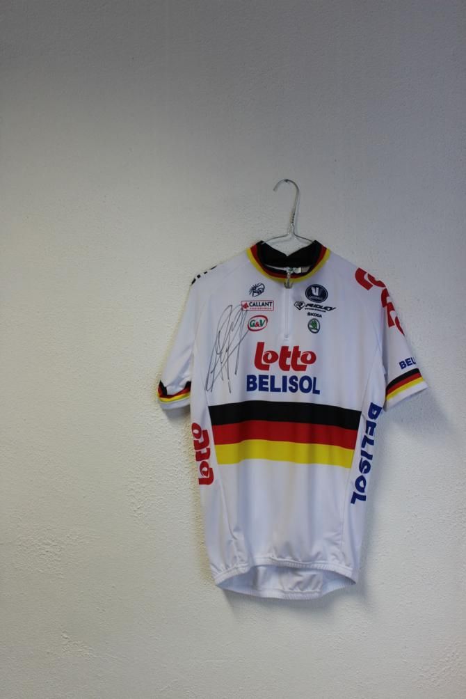 Andr&eacute; Greipel's 2013 German champion's jersey hangs on the wall