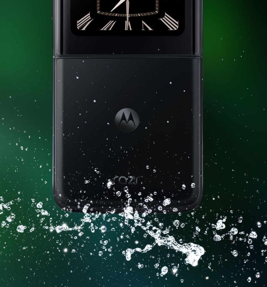 The Motorola Razr 2022 from behind, on a green background, with water splashing over the base