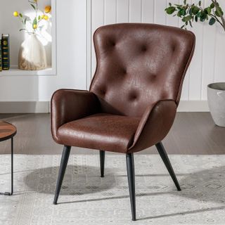high back leather chair in a minimalist room