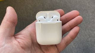 Apple AirPods with the case open