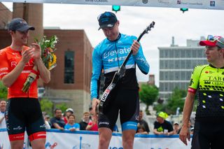 Sam Bassetti (Elevate-KHS) checks out the guitar he got for first place at the Winston-Salem Cycling Classic on May 28, 2018 in Winston-Salem, North Carolina.
