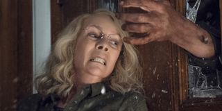 Jamie Lee Curtis Laurie Strode attacked by Michael Myers in Halloween 2018