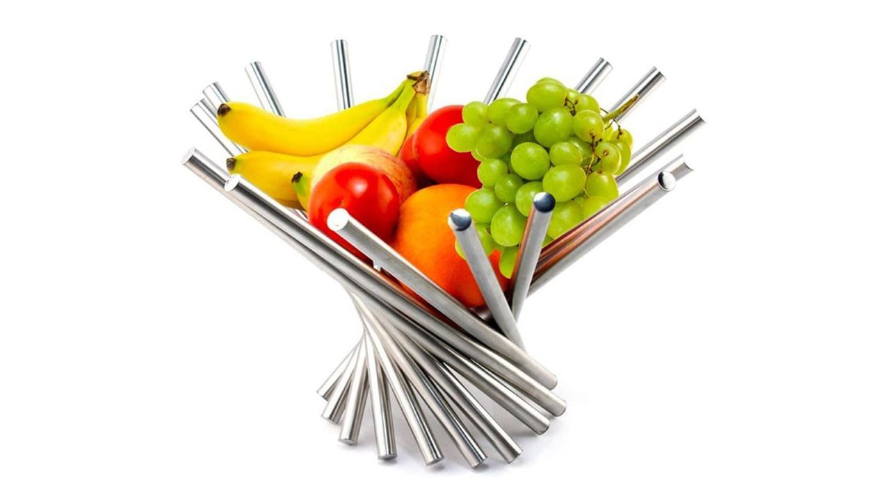 A collapsible fruit bowl with fruit in it