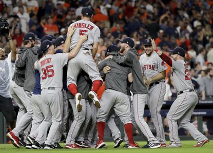 Boston Red Sox players celebrate their pennant win.
