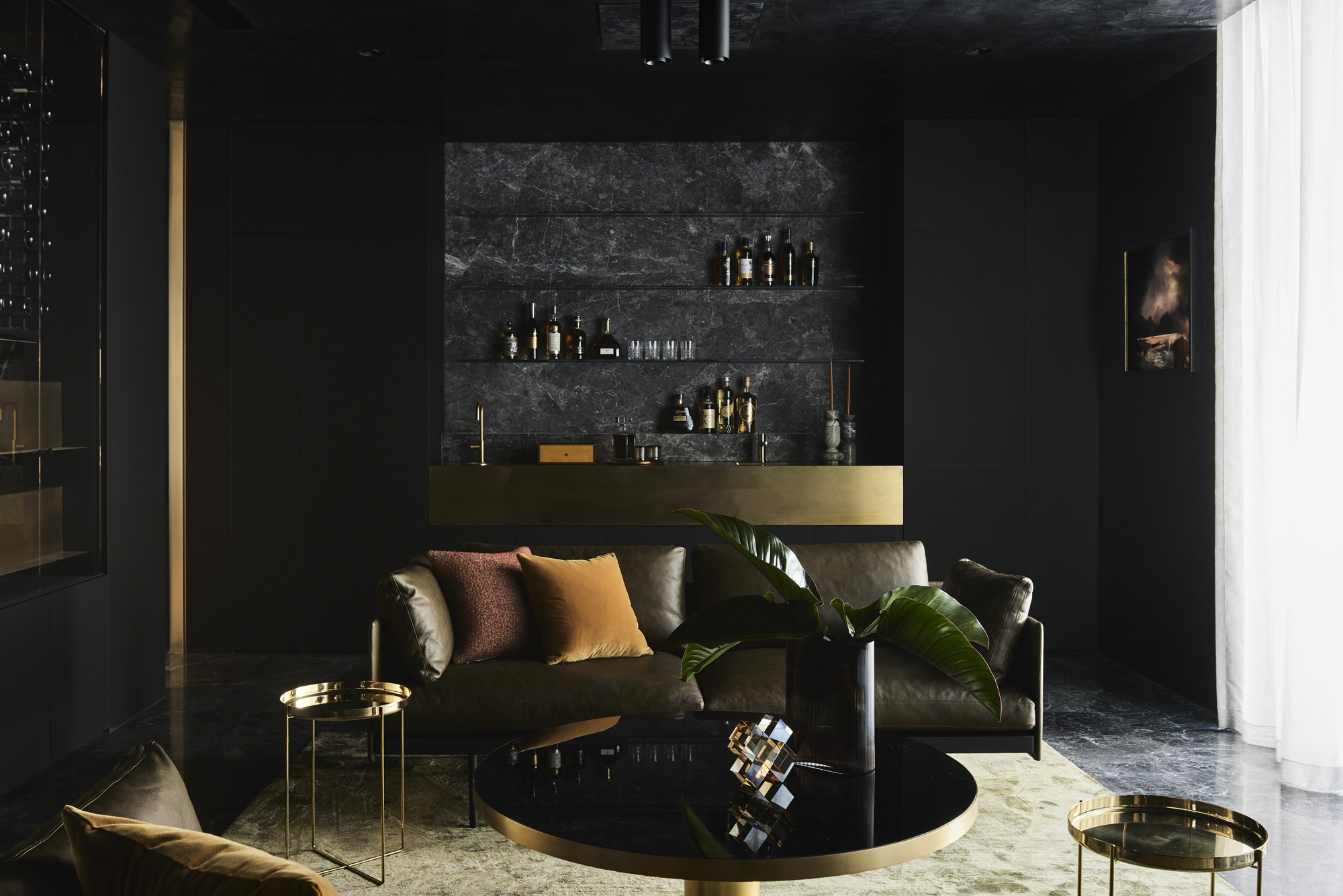 dark living space at Curatorial House in Melbourne