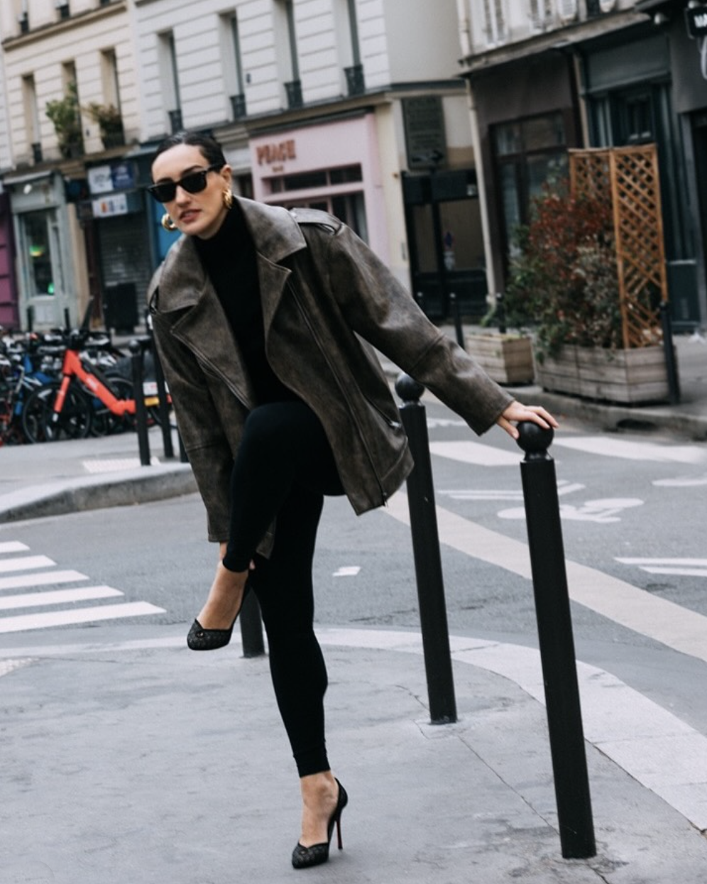 woman in leggings and heels