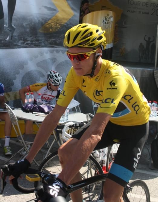 After a quick read of the morning papers, Froome set off to join the peloton