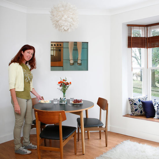 Dinning room with white walls and wooden flooring