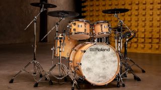 Roland VAD706 kit on a concrete floor with a wooden background