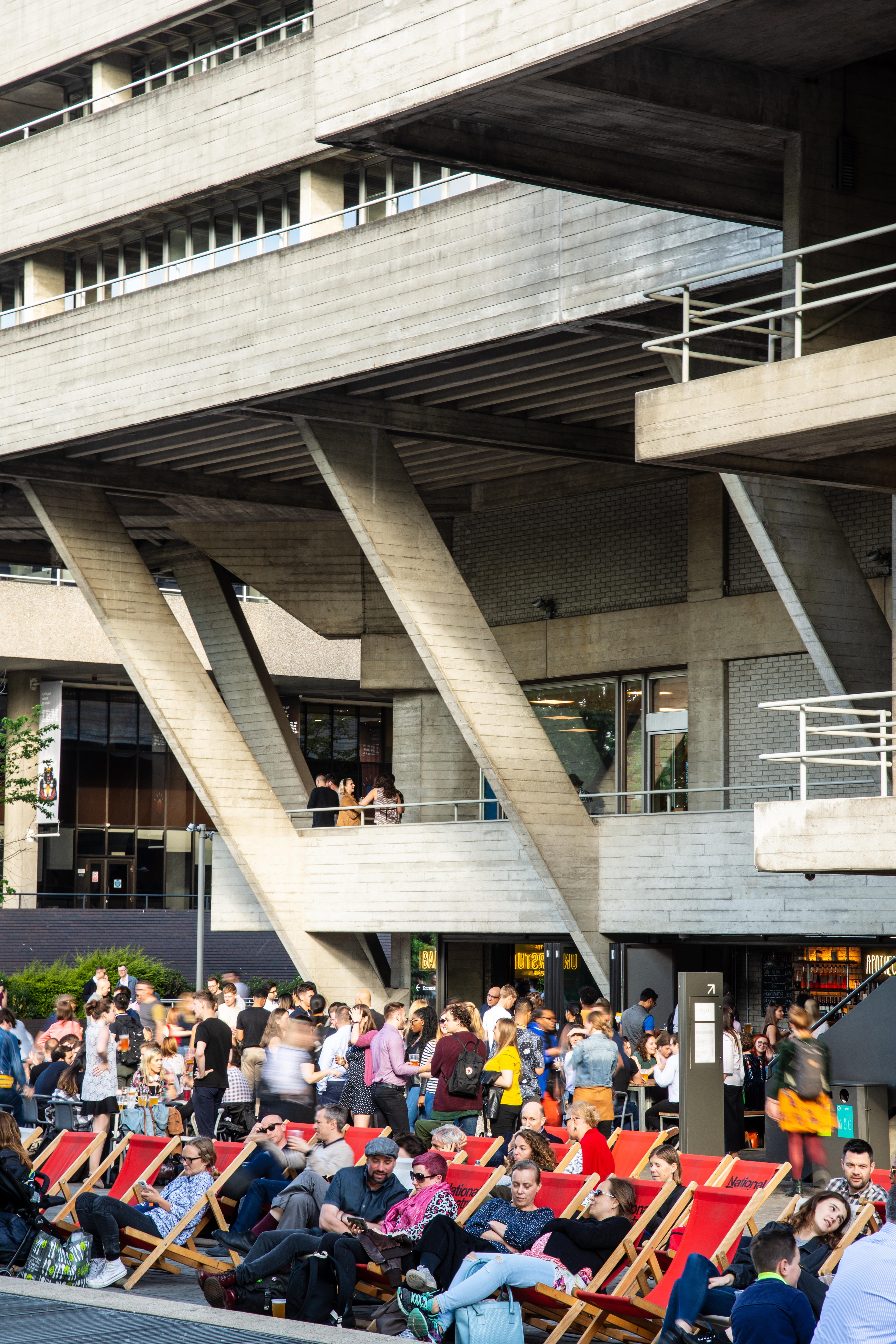 People in deckchairs infront of the National Theatre