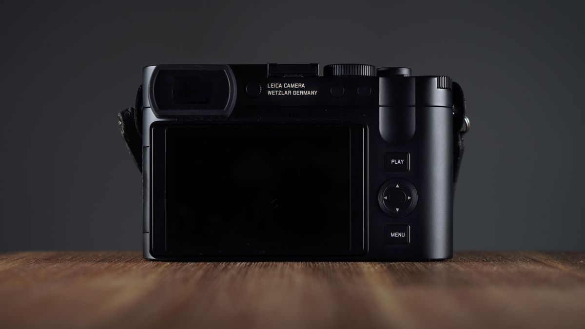 Leica Q3 Monochrom on a wooden surface