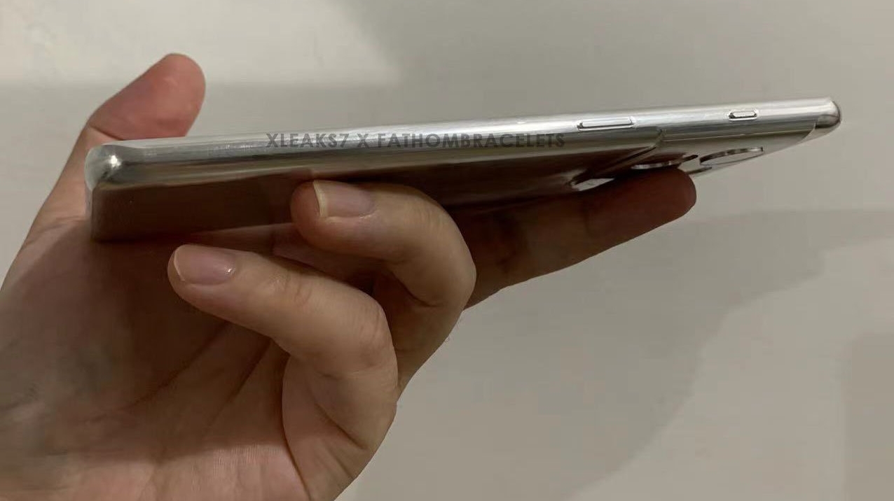 A OnePlus 10 Pro aluminum dummy unit from the side