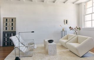 Minimalist white living room by Kelly Wearstler