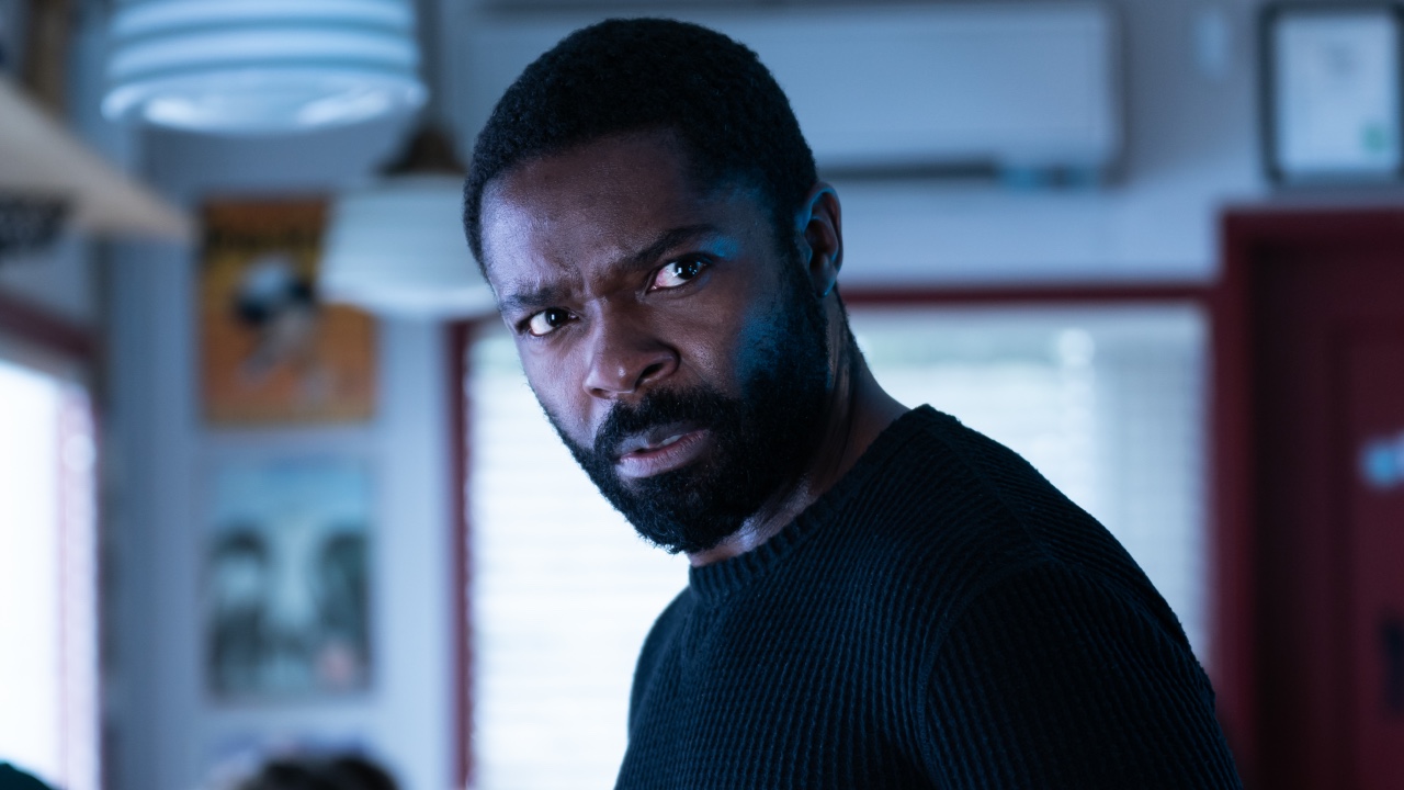Chris Newborn (David Oyelowo) examines his surroundings while in a diner in Newborn.