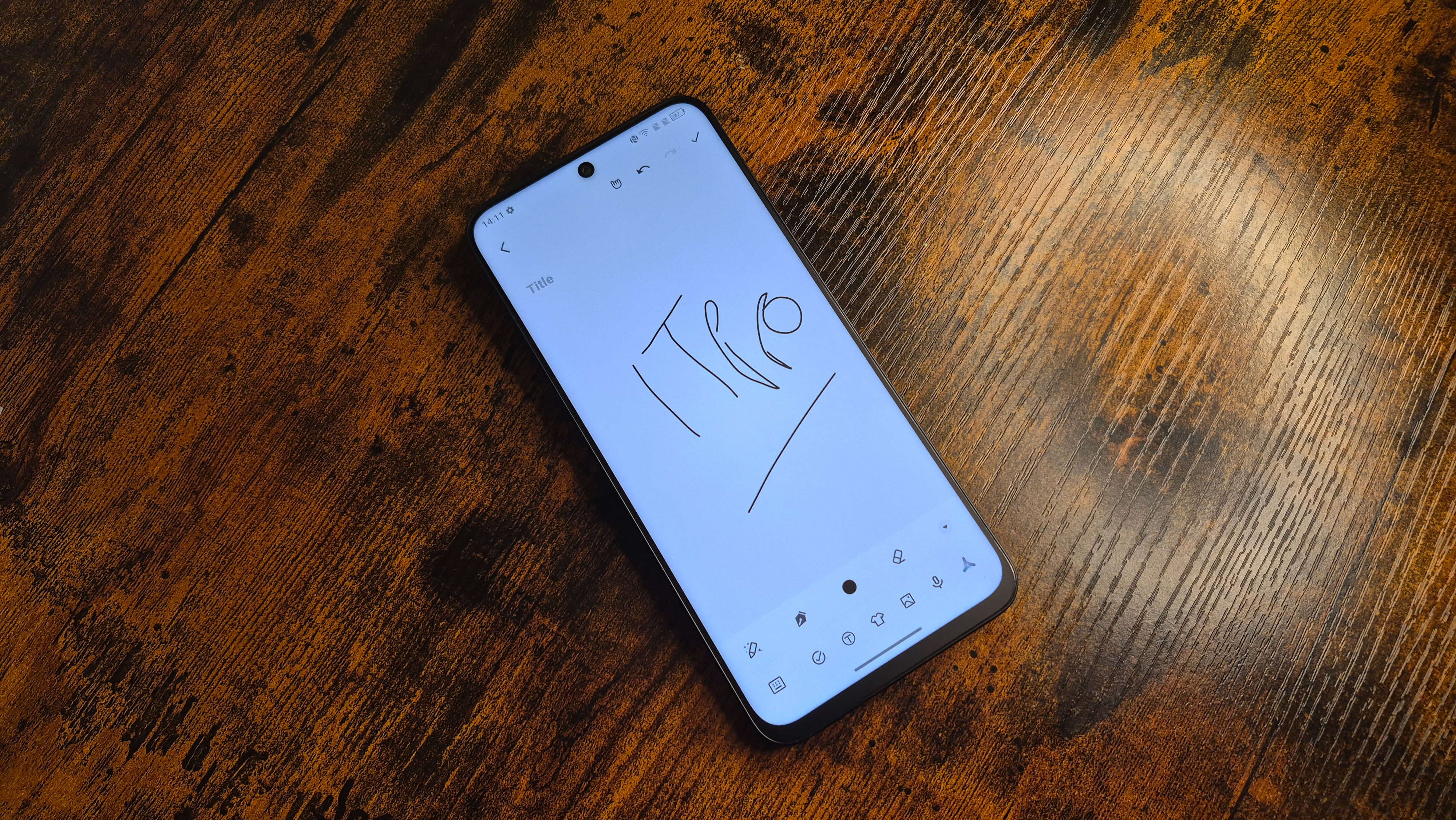 The TCL Nxtpaper 60 Ultra on a desk