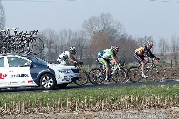 Team cars visit the escape in Nokere