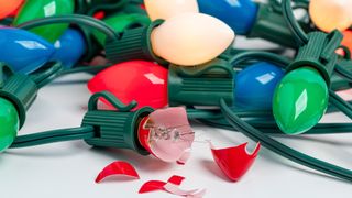 colorful Christmas lights with one broken bulb 
